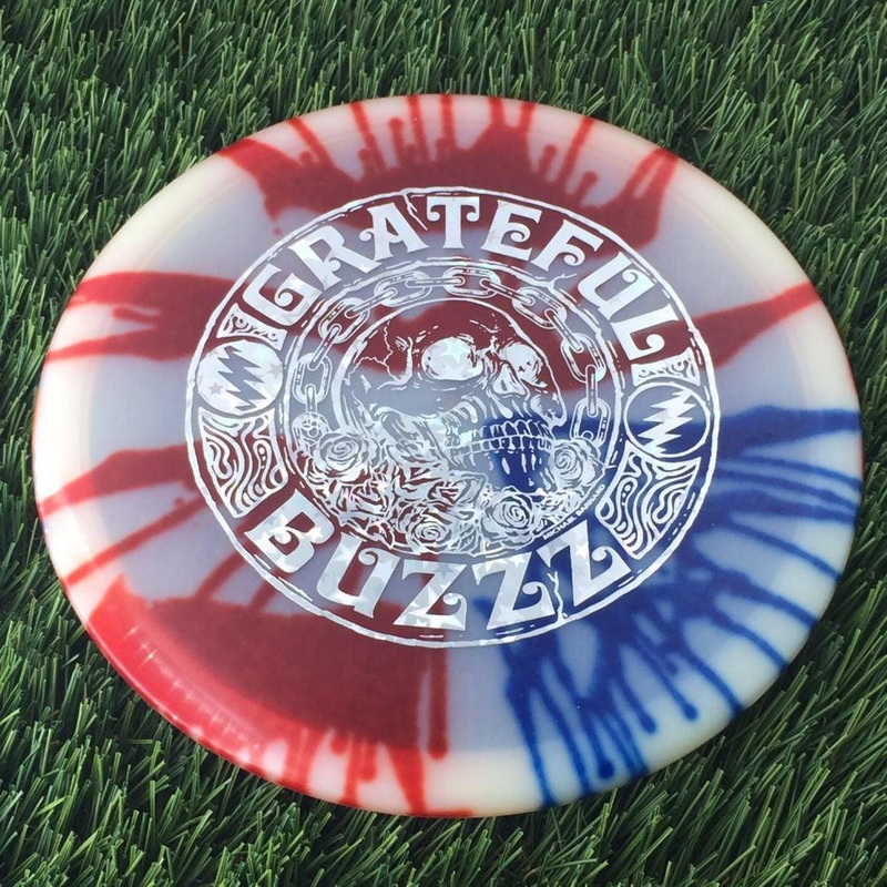 Discraft Elite Z Fly-Dyed Buzzz with 2023 Ledgestone Edition – Wave 2 Stamp – 180g – Translucent Flag