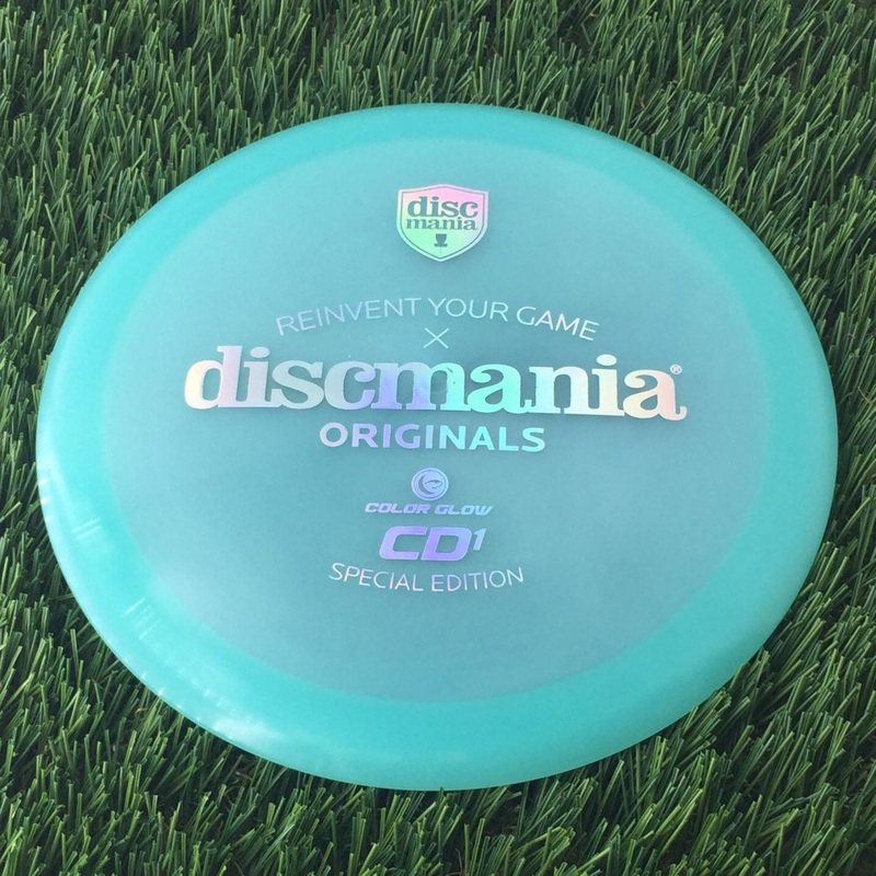 Discmania C-Line Color Glow Reinvented CD1 with Discmania Originals x Reinvent Your Game Special Edition Stamp – 173g – Translucent Turquoise Green