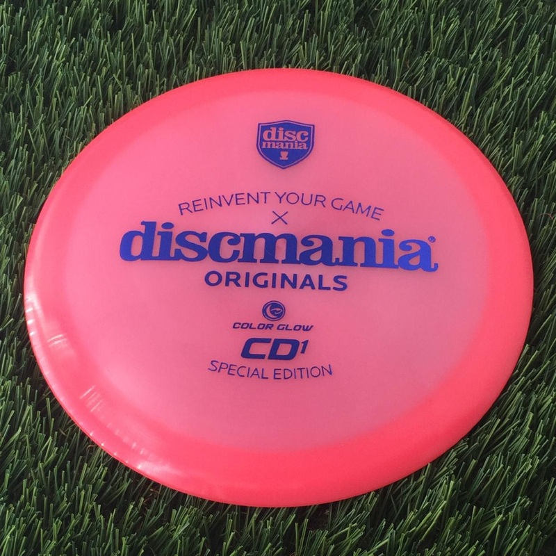 Discmania C-Line Color Glow Reinvented CD1 with Discmania Originals x Reinvent Your Game Special Edition Stamp – 173g – Translucent Neon Pink