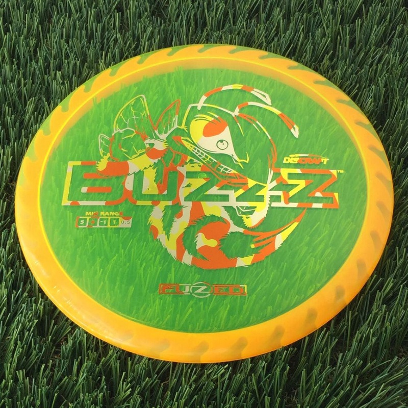 Discraft Elite Z FuZed Line with Saw Pattern Buzzz with Big Bee with Saw Blade – “Buzzzsaw” Stamp – 180g – Translucent Light Orange