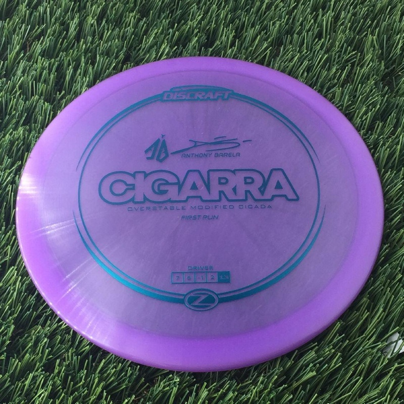 Discraft Elite Z Cigarra with First Run – Anthony Barela “AB” Signature – Overstable Modified Cicada Stamp – 176g – Purple