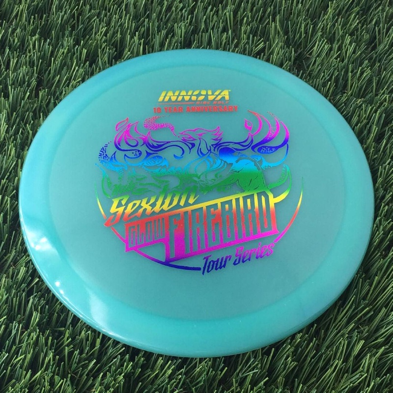 Innova Proto Color Glow Champion Firebird with Nate Sexton “Sexybird” 10 Year Anniversary Tour Series Stamp – 175g – Translucent Turquoise Blue