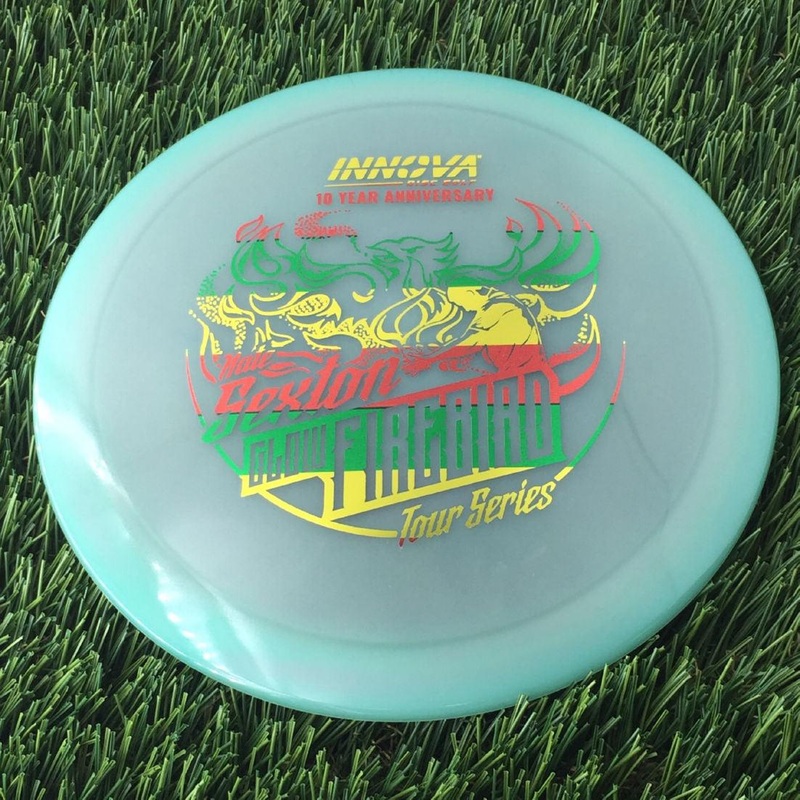 Innova Proto Color Glow Champion Firebird with Nate Sexton “Sexybird” 10 Year Anniversary Tour Series Stamp – 175g – Translucent Muted Green