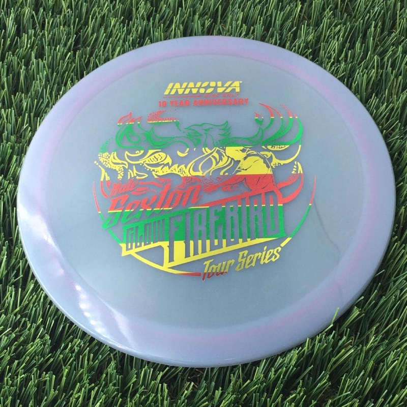 Innova Proto Color Glow Champion Firebird with Nate Sexton “Sexybird” 10 Year Anniversary Tour Series Stamp – 175g – Translucent Muted Purple