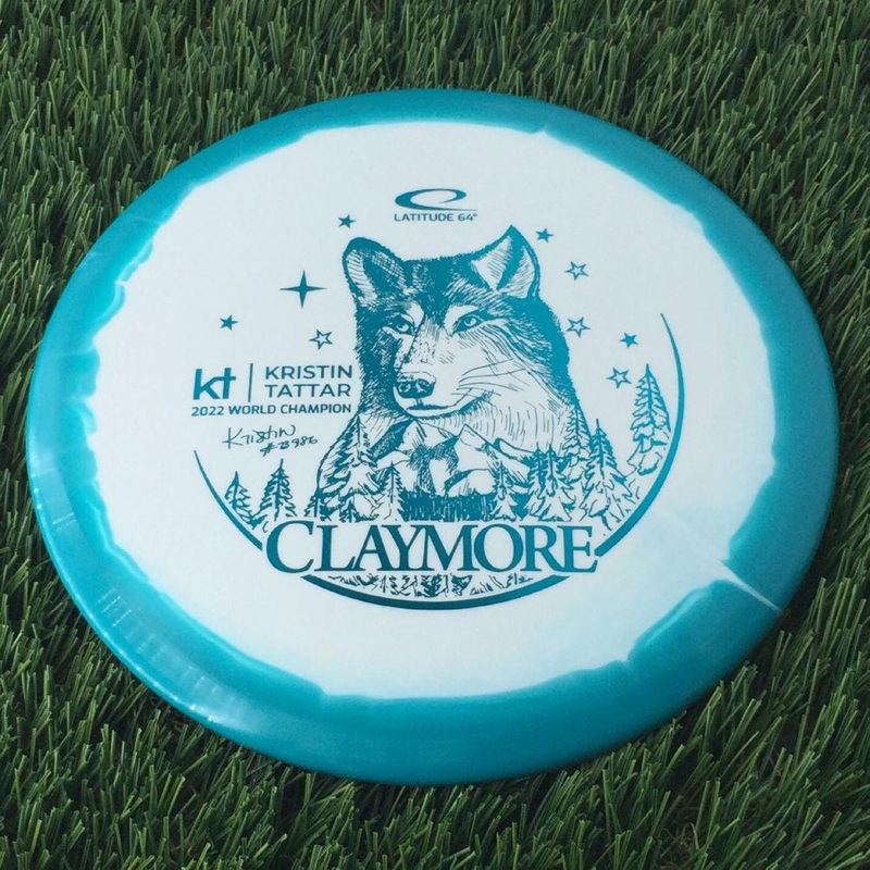Latitude 64 Gold Line Orbit Claymore with Kristin Tattar #73986 – 2022 World Champion Team Series 2023 Stamp – 178g Aqua Green