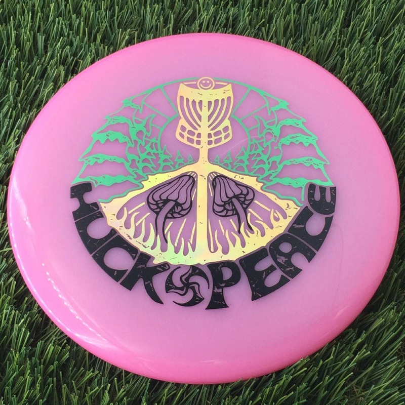 Discmania Soft Neo Spore with Huck Peace – Small TriFly in the Forest – Triple Foil Stamp – 157g – Translucent Pink