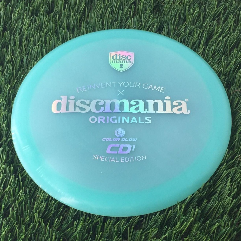 Discmania C-Line Color Glow Reinvented CD1 with Discmania Originals x Reinvent Your Game Special Edition Stamp – 174g – Translucent Turquoise Green