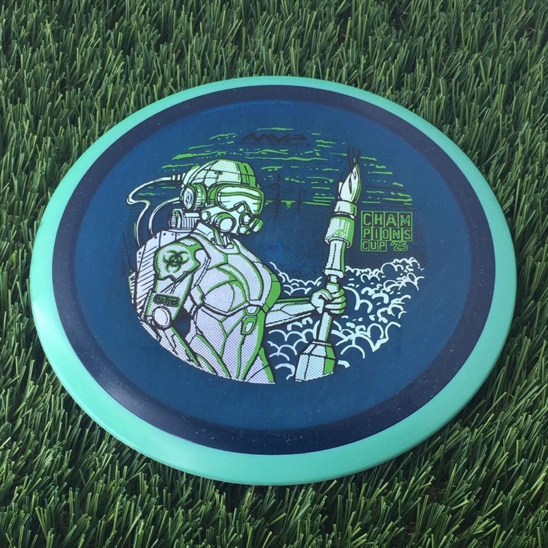 Axiom Particle Glow Proton Virus with OTB Champions Cup 2025 – Jane DOE by John Dorn Stamp – 168g – Turquoise Rim Blue