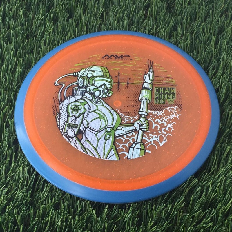 Axiom Particle Glow Proton Virus with OTB Champions Cup 2025 – Jane DOE by John Dorn Stamp – 172g – Blue Rim Orange
