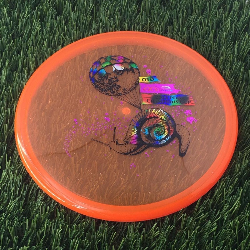 Axiom Prism Proton Soft Envy with OTB Champions Cup 2025 – Snail Mail by Pirate Nate Stamp – 172g – Orange