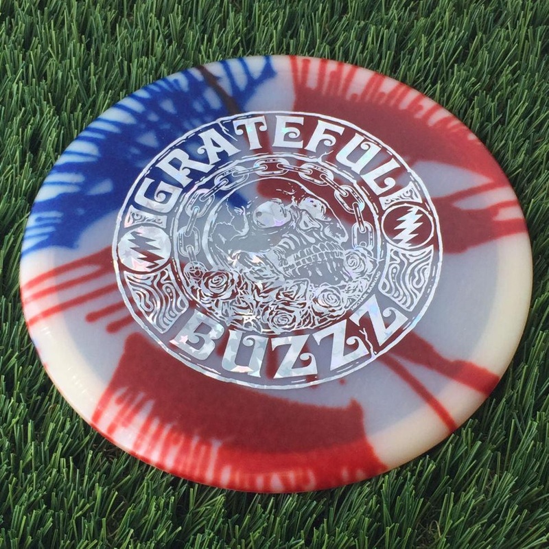 Discraft Elite Z Fly-Dyed Buzzz with 2023 Ledgestone Edition – Wave 2 Stamp – 180g – Translucent Dyed